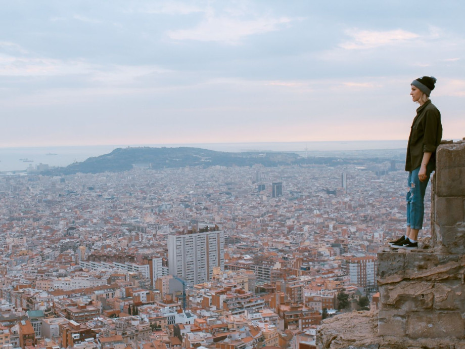 Woman looking over the city of Barcelona.